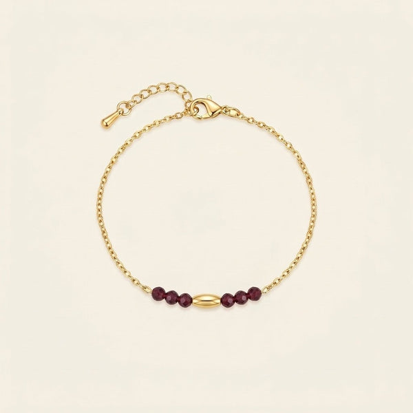 Bracelet Grenade fin en grenat, acier inoxydable doré - Verika Bijoux